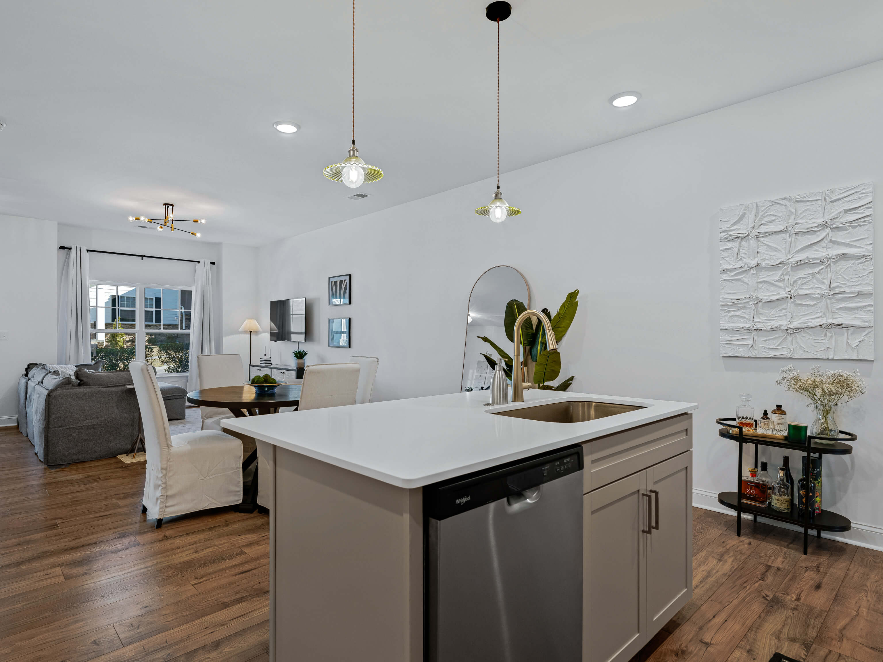 Open-concept kitchen and living area with modern finishes